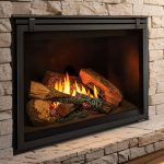 Cozy stone fireplace with glowing logs and vibrant flames, creating a warm and inviting atmosphere.