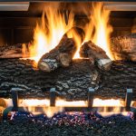 Cozy fireplace with burning logs and vibrant flames creating a warm, inviting ambiance.
